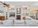 Comfortable living room with a fireplace and custom built-in shelving for storage and display at 4803 Bucks Bluff Dr., North Myrtle Beach, SC 29582