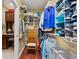 Organized walk-in closet featuring shelves, hanging rods, shoe racks, and drawers for optimal storage at 4803 Bucks Bluff Dr., North Myrtle Beach, SC 29582
