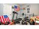 Multipurpose room equipped as a home gym, with space for fitness equipment and a cozy reading chair at 4811 Innisbrook Ct. # 306, Myrtle Beach, SC 29579