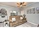 Relaxing living room with a comfy couch and plenty of natural light at 4811 Innisbrook Ct. # 306, Myrtle Beach, SC 29579
