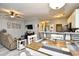 Open-concept living and dining area featuring modern decor and an airy layout, perfect for entertaining and relaxation at 4811 Innisbrook Ct. # 306, Myrtle Beach, SC 29579