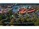 Aerial view of commercial district with shops, restaurants, and a lighthouse near a waterfront and a Ferris wheel at 4861 Hopespring St., Myrtle Beach, SC 29579