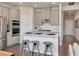 Modern kitchen featuring stainless steel appliances, ample counter space, and a stylish kitchen island with bar stool seating at 4861 Hopespring St., Myrtle Beach, SC 29579