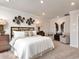 Serene main bedroom featuring a plush bed, elegant decor, soft lighting, and a tranquil ambiance for restful nights at 4861 Hopespring St., Myrtle Beach, SC 29579