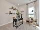 Office space with a desk, chair, shelves, and a large window offering natural light at 4861 Hopespring St., Myrtle Beach, SC 29579
