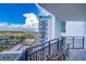 Condo balcony with chairs overlooking an expansive skyline and building exterior at 504 N Ocean Blvd. # 1711, Myrtle Beach, SC 29577