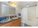 Clean bathroom features a single sink vanity and a shower-tub combination at 504 N Ocean Blvd. # 1711, Myrtle Beach, SC 29577