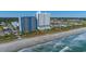 Aerial view of a beachfront hotel with pools and beach access at 504 N Ocean Blvd. # 1711, Myrtle Beach, SC 29577