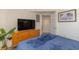 Well-appointed bedroom with a large TV and nautical-themed decor at 504 N Ocean Blvd. # 1711, Myrtle Beach, SC 29577