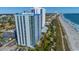 Attractive condominium building with white and blue accents with stunning beach access at 504 N Ocean Blvd. # 1711, Myrtle Beach, SC 29577