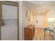 Hallway with a stackable washer and dryer for convenient in-unit laundry at 504 N Ocean Blvd. # 1711, Myrtle Beach, SC 29577