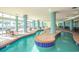 Indoor pool and hot tub area with lounge seating at 504 N Ocean Blvd. # 1711, Myrtle Beach, SC 29577
