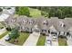 Aerial view of townhomes with well-maintained lawns and tree-lined streets near the golf course at 511 Colonial Trace Dr. # 7-C, Longs, SC 29568