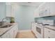 Bright kitchen with white cabinets, granite countertops, and modern appliances for a clean aesthetic at 511 Colonial Trace Dr. # 7-C, Longs, SC 29568