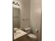 Bathroom featuring a vanity sink, mirror, toilet, toilet paper holder, and light fixture at 5206 Sweetwater Blvd. # 5206, Murrells Inlet, SC 29576