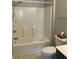 Bathroom featuring a tub and shower combo, toilet, and a vanity sink at 5206 Sweetwater Blvd. # 5206, Murrells Inlet, SC 29576