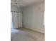 Spacious bedroom with neutral carpet, ceiling fan, and patio access at 5206 Sweetwater Blvd. # 5206, Murrells Inlet, SC 29576