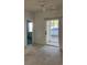 Bedroom featuring sliding glass door to a patio, carpet flooring and ceiling fan at 5206 Sweetwater Blvd. # 5206, Murrells Inlet, SC 29576
