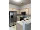 Bright kitchen with stainless steel appliances and light wood cabinetry at 5206 Sweetwater Blvd. # 5206, Murrells Inlet, SC 29576