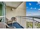 Enjoy breathtaking ocean views from this private balcony with comfortable seating at 5300 N Ocean Blvd. N # 1120, Myrtle Beach, SC 29577