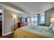 This airy bedroom offers balcony access, ocean views, and a flat screen TV at 5300 N Ocean Blvd. N # 1120, Myrtle Beach, SC 29577