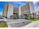 Hotel exterior featuring well-manicured landscaping, covered entrance, and convenient parking at 5300 N Ocean Blvd. N # 1120, Myrtle Beach, SC 29577