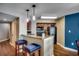 Well-equipped kitchen area with breakfast bar, stainless steel appliances, and wood cabinets at 5300 N Ocean Blvd. N # 1120, Myrtle Beach, SC 29577