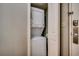 Convenient in-unit laundry closet with stacked washer and dryer for easy chores at 5300 N Ocean Blvd. N # 1120, Myrtle Beach, SC 29577