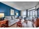 Comfortable living area with couch, armchairs, and scenic views of the ocean at 5300 N Ocean Blvd. N # 1120, Myrtle Beach, SC 29577