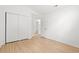 Bedroom with wood floors and double closet near open doorway at 535 Wildflower Trail, Myrtle Beach, SC 29579