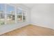 Bedroom with window view and wood-look flooring at 535 Wildflower Trail, Myrtle Beach, SC 29579