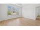 Bedroom with big windows with natural light and wood-look flooring at 535 Wildflower Trail, Myrtle Beach, SC 29579