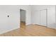 Bedroom with wood-look floors, closet, and ample space at 535 Wildflower Trail, Myrtle Beach, SC 29579