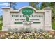 Community sign for Southcreek, Myrtle Beach National, surrounded by flowers and greenery at 535 Wildflower Trail, Myrtle Beach, SC 29579