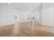 Bright, open living room with light wood floors, white walls, and large windows offering plenty of natural light at 535 Wildflower Trail, Myrtle Beach, SC 29579