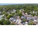 Aerial view showcasing a coastal neighborhood with trees and the property marked by a pin near the coastline at 6001 - 1805 S Kings Hwy., Myrtle Beach, SC 29575