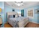 Relax in this cozy bedroom with beachy decor, natural light, and comfortable furnishings at 6001 - 1805 S Kings Hwy., Myrtle Beach, SC 29575