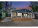 Charming blue home with inviting front porch and white picket fence at 6001 - 1805 S Kings Hwy., Myrtle Beach, SC 29575