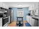 Bright kitchen featuring stainless steel appliances, granite countertops, and natural light at 6001 - 1805 S Kings Hwy., Myrtle Beach, SC 29575