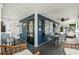 Charming covered porch with comfortable furniture and a relaxing ambiance at 6001 - 1805 S Kings Hwy., Myrtle Beach, SC 29575