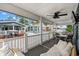 Spacious covered porch offers ample seating and neighborhood views at 6001 - 1805 S Kings Hwy., Myrtle Beach, SC 29575