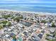 Breathtaking aerial view showcasing a vibrant coastal community, pond and beautiful beachfront with crystal-clear waters at 6001-1454 S Kings Hwy., Myrtle Beach, SC 29575