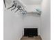 Walk-in closet with white shelving, clothes, and a TV at 6001-1454 S Kings Hwy., Myrtle Beach, SC 29575