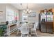 Cozy dining area featuring a charming table, natural light, and stylish decor at 6001-1454 S Kings Hwy., Myrtle Beach, SC 29575