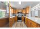 Well-equipped kitchen features stainless steel appliances, ample counter space, and modern cabinetry at 6001-1454 S Kings Hwy., Myrtle Beach, SC 29575