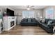 Inviting living room featuring a fireplace, comfortable sofas, and ample natural light at 6001-1454 S Kings Hwy., Myrtle Beach, SC 29575