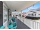 Inviting covered porch with comfortable seating, offering a relaxing outdoor space at 6001-1454 S Kings Hwy., Myrtle Beach, SC 29575