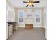 Cozy home office with natural light, built-in storage, neutral carpet, and space for a desk and accessories at 603 Sea Island Way, North Myrtle Beach, SC 29582