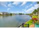 Scenic lake view showcasing waterfront living, community landscaping, and clear blue skies at 603 Sea Island Way, North Myrtle Beach, SC 29582
