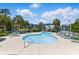 Resort-style community pool with ample seating, a hot tub, and a covered pool house at 603 Sea Island Way, North Myrtle Beach, SC 29582